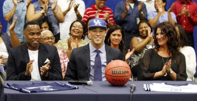 Veronica Gutierrez with her son, Devin Booker (middle), and ex-partner, Melvin Booker (right).